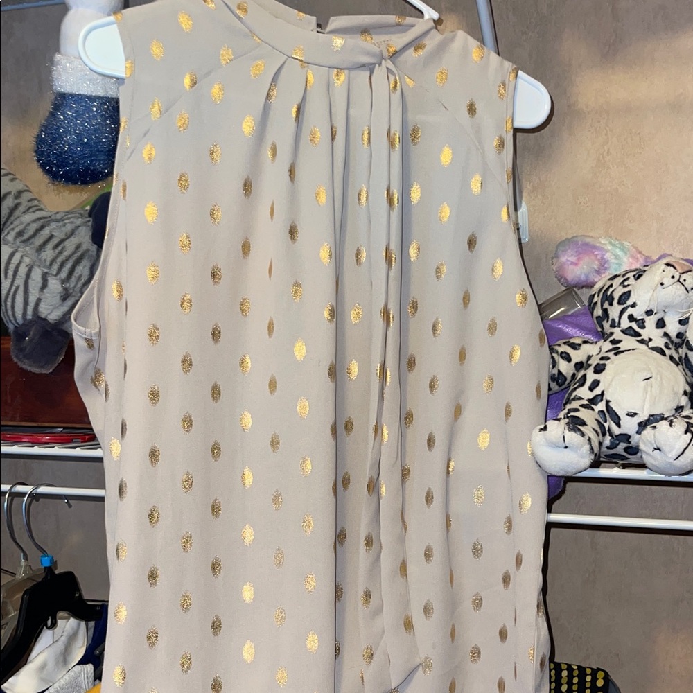 Chic Sleeveless Blouse with Gold Accents